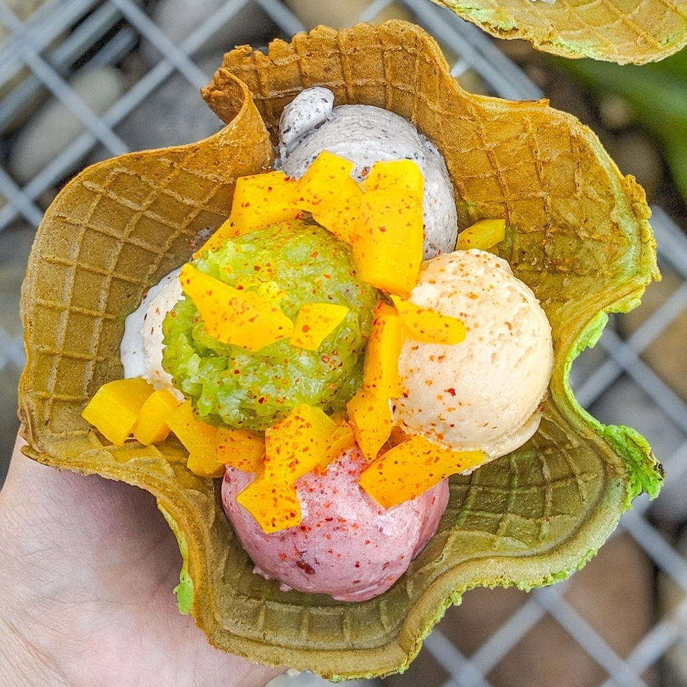 Mini palette of Thai gelato and sorbet scoops in a pandan waffle bowl